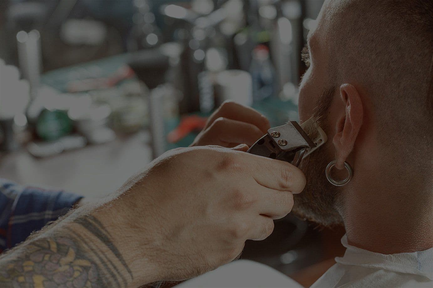 Water Valley Barbershop — a barber at work