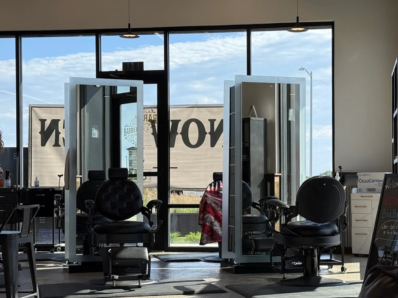 Inside Water Valley Barbershop — barber stations and chairs